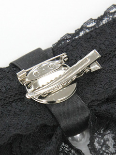 ビジューリボンブローチ